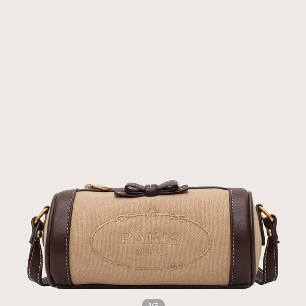 Cute barrel Paris bag. Perfect for young girl.